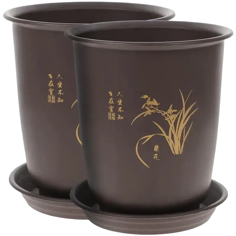 Dark brown ceramic orchid pots with gold-leaf designs and chinese calligraphy paired with matching plant nursery pots trays