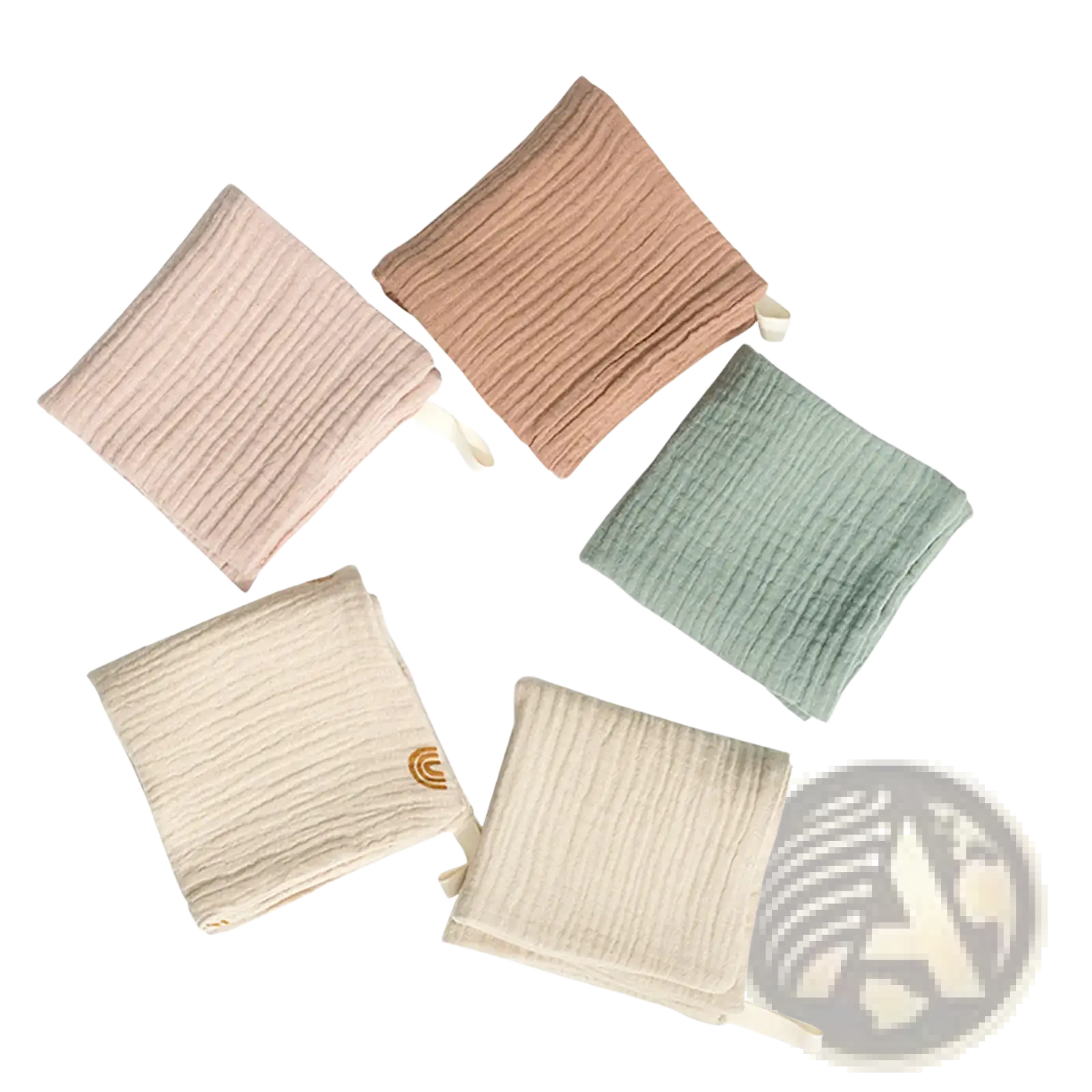 Organic cotton baby bath towel and muslin set in soft pastel colors with subtle ribbed texture and small fabric ties