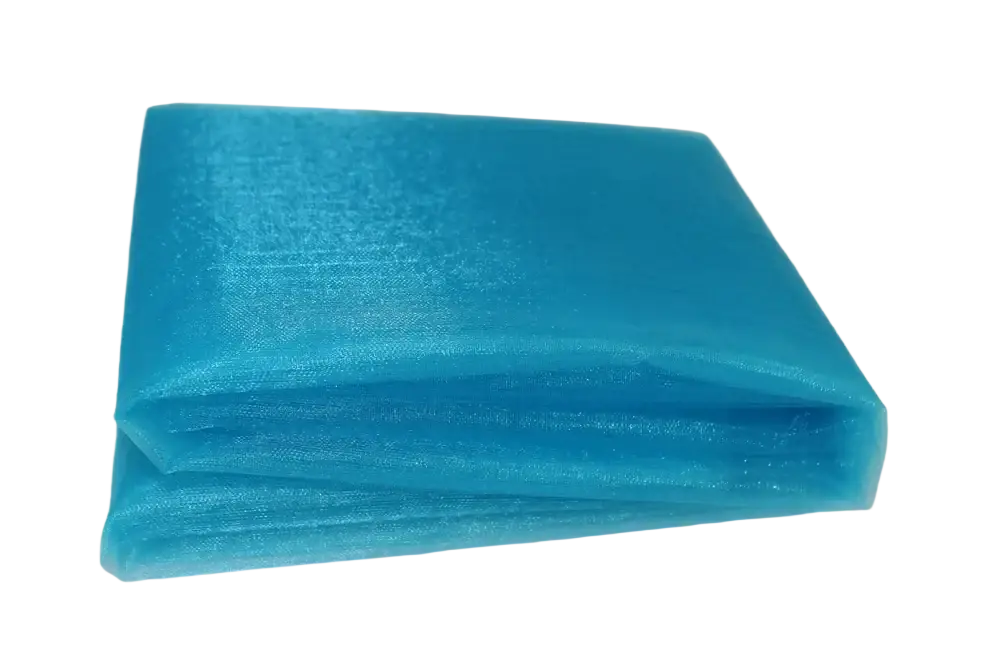 Folded piece of translucent turquoise organza fabric with subtle sheen 70cm width diy decor roll