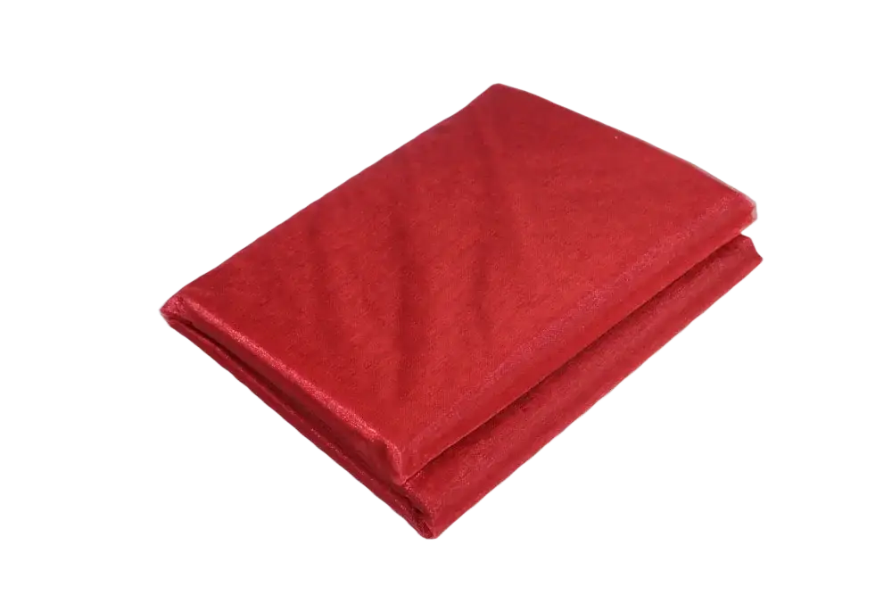 A folded red organza fabric roll with subtle sheen and delicate translucent texture for diy decor projects