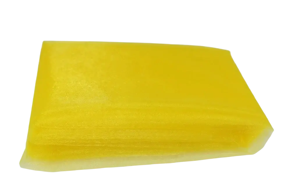 A stack of translucent yellow organza fabric with 70cm width suitable for diy decor roll projects