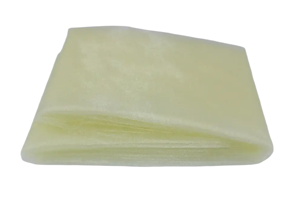 A translucent pale yellow organza fabric sheet folded neatly in a 70cm width diy decor roll