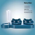 Navy blue orthopedic cat feeder with automatic waterer bowl set featuring two ceramic bowls and a clear water bottle