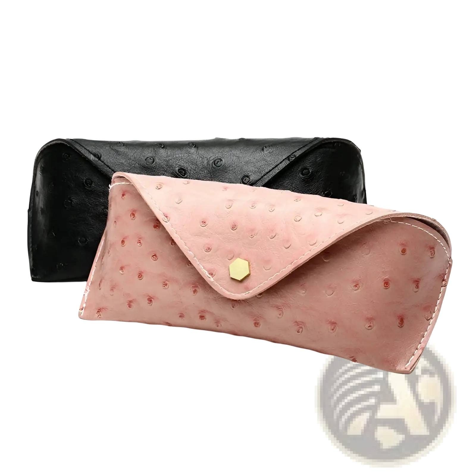 Pink ostrich leather eyeglass case with polka dot pattern and hexagonal gold-tone clasp for stylish storage