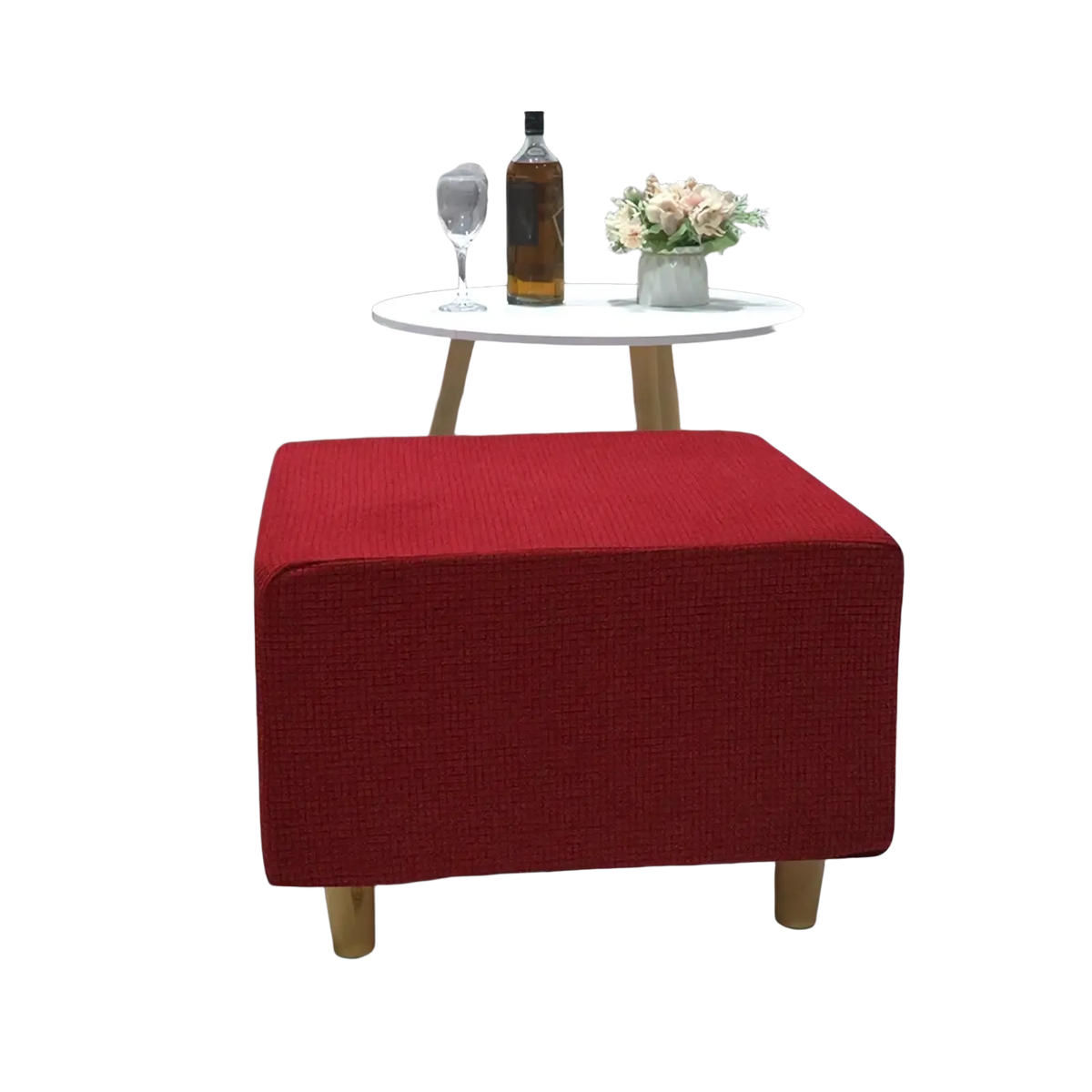 Red upholstered ottoman with wooden legs featuring a stretch elastic slipcover for footrest protection