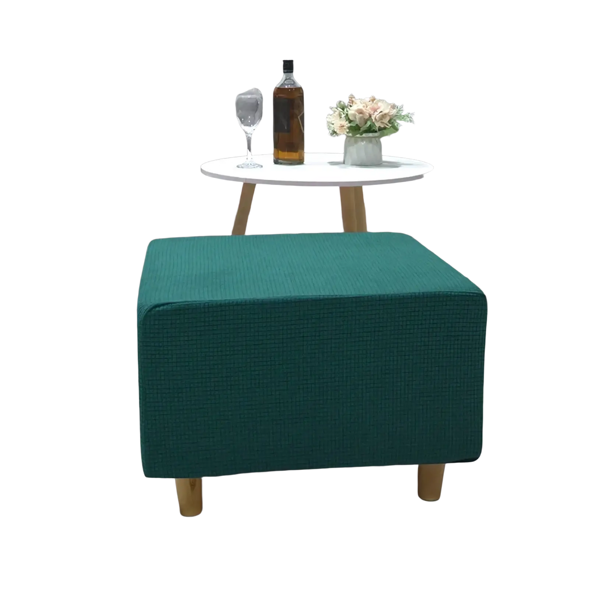 Teal upholstered ottoman with wooden legs featuring a stretch elastic slipcover for footrest protection