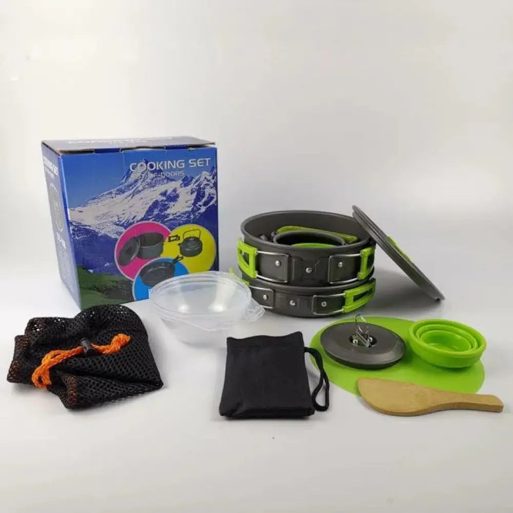 Compact foldable lightweight camping cookware set with gray and lime green aluminum pot featuring interlocking rings for storage