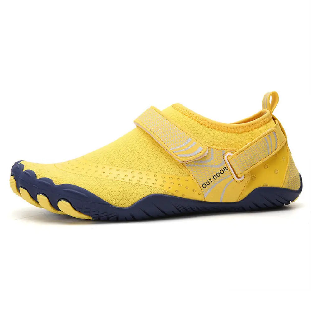Lightweight cut resistant five finger outdoor wading shoe in bright yellow with navy mesh upper and adjustable velcro strap