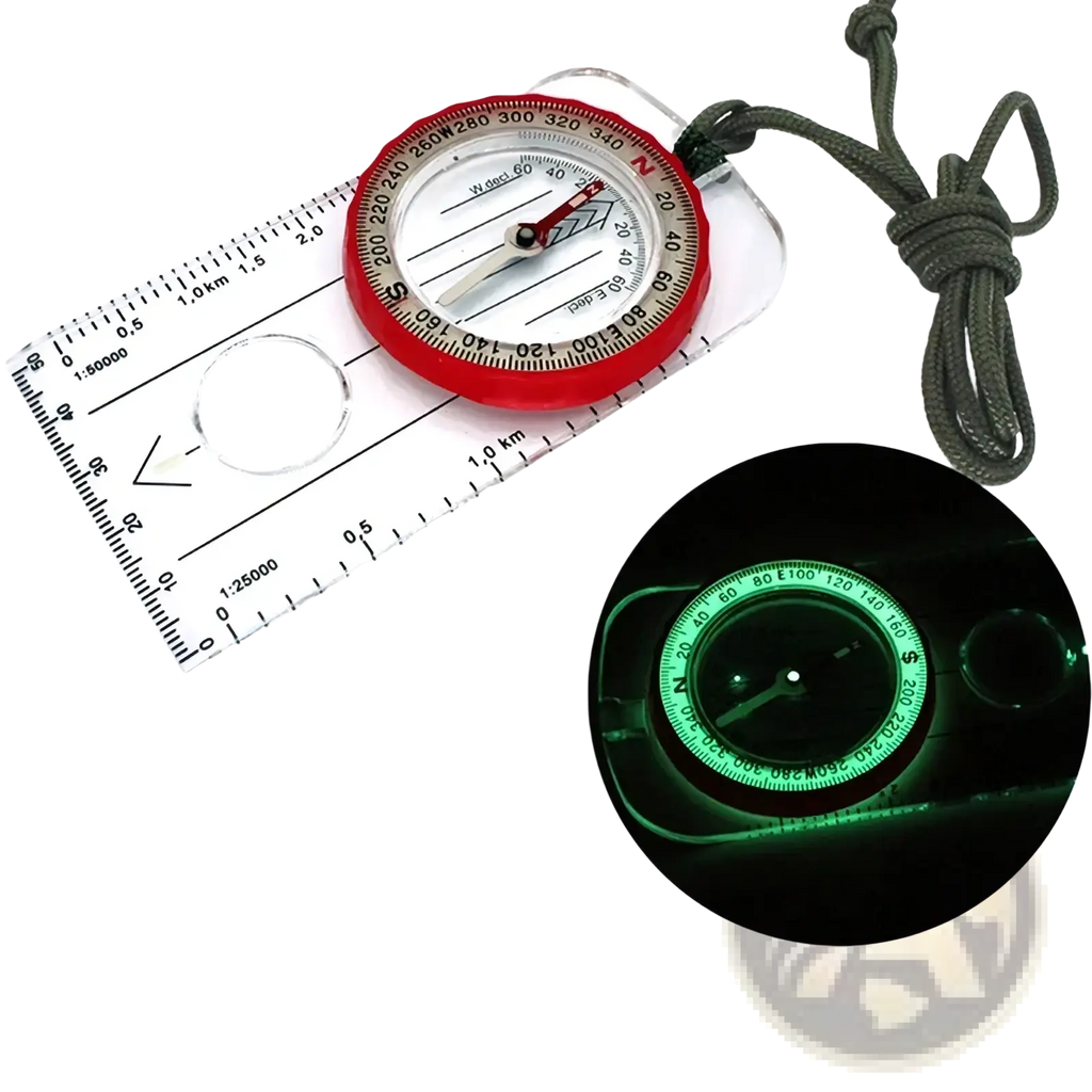 Outdoor navigation compass with red and clear plastic body glow-in-the-dark face map scale and attached lanyard