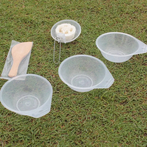 Set of three translucent plastic mixing bowls with handles and one containing a white sponge and metal stand from Arbaglobal