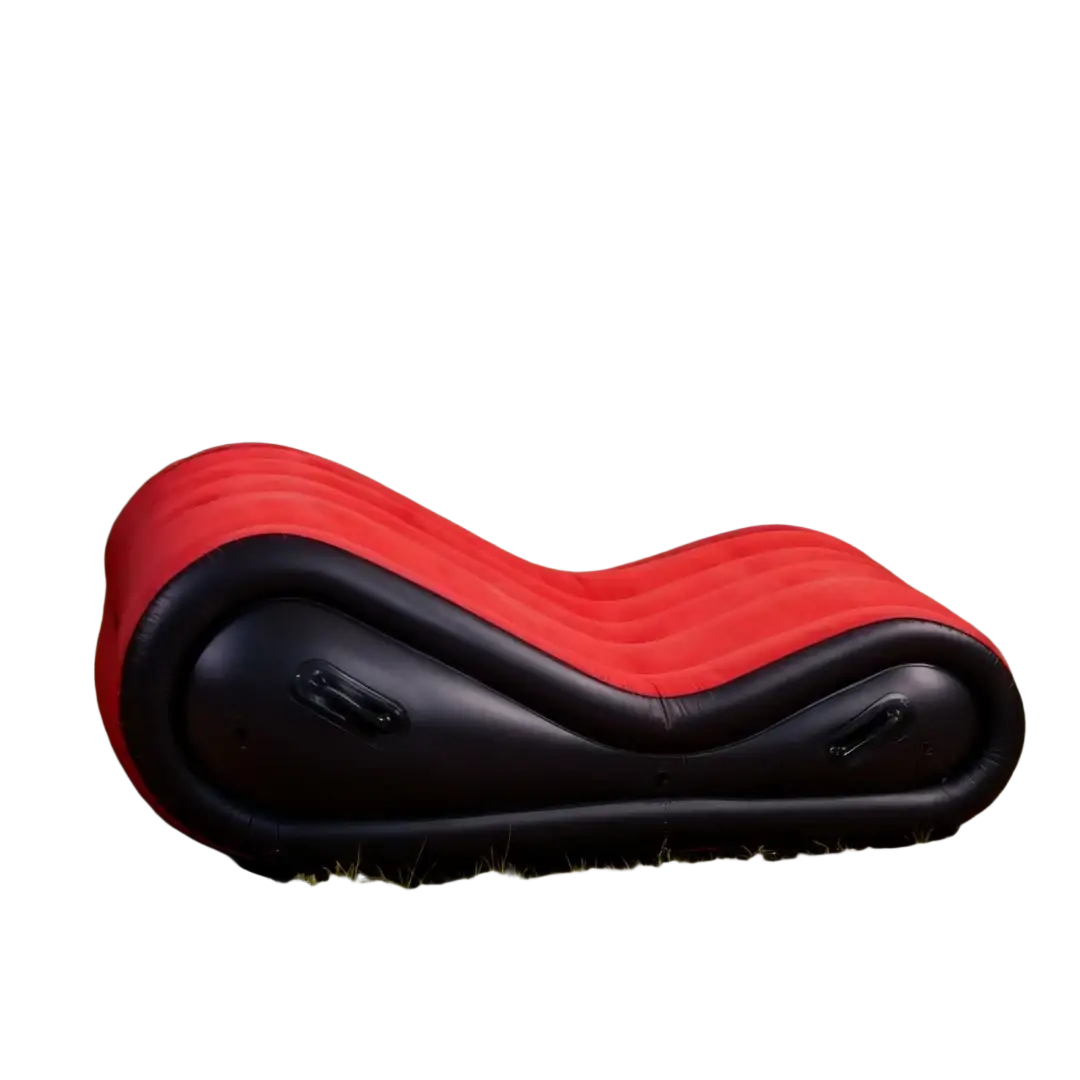 Red and black outdoor portable inflatable sofa bed with sleek curved design for comfortable lounging