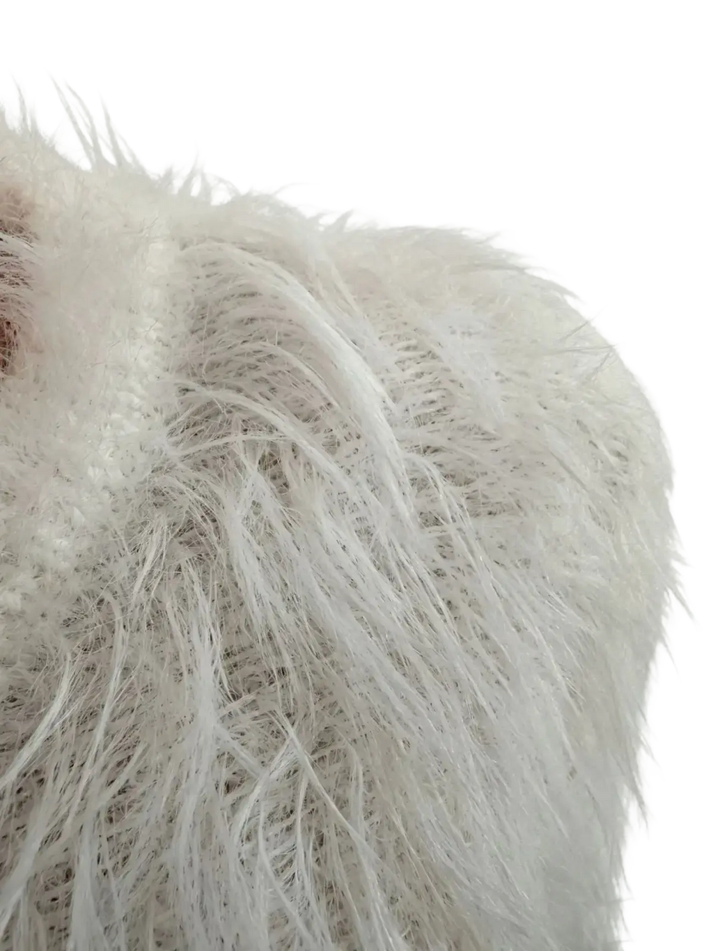 A plush white fuzzy skirt set for outfits woman featuring soft fluffy textured fabric and dense appearance