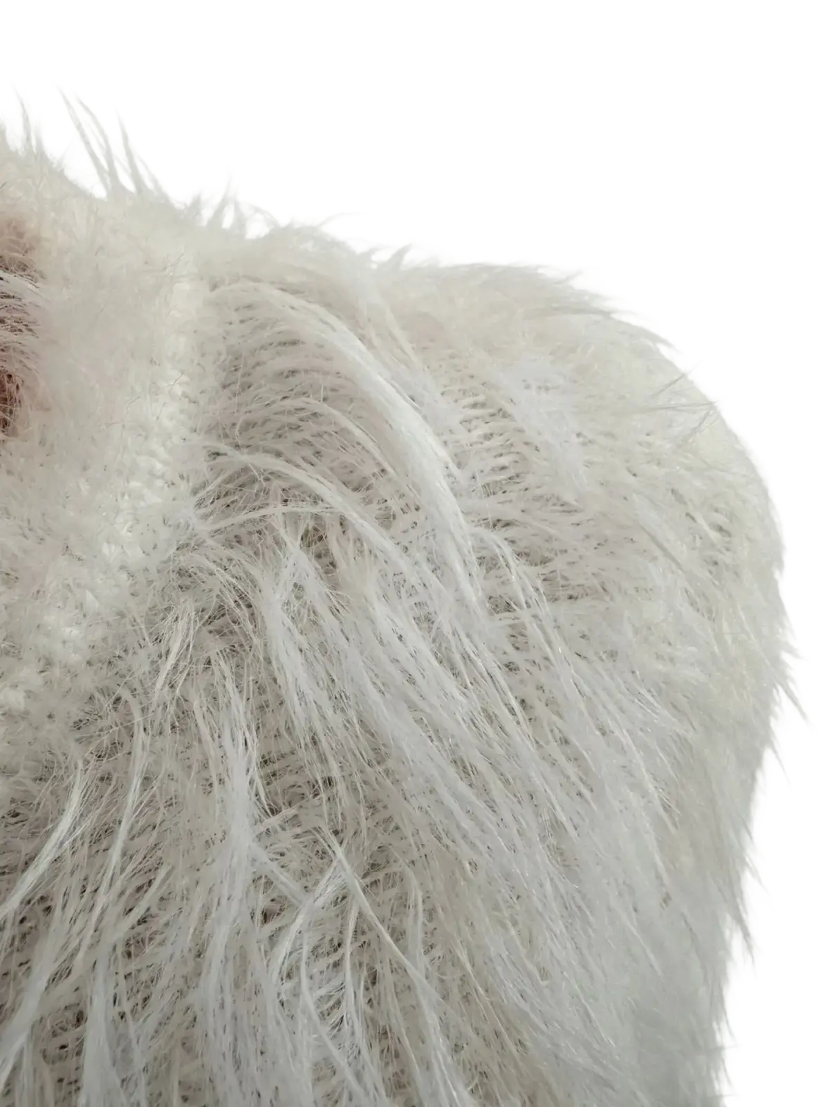 A plush white fuzzy skirt set for outfits woman featuring soft fluffy textured fabric and dense appearance