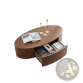 Modern oval coffee table in dark walnut wood with storage drawer open showing books and magazines