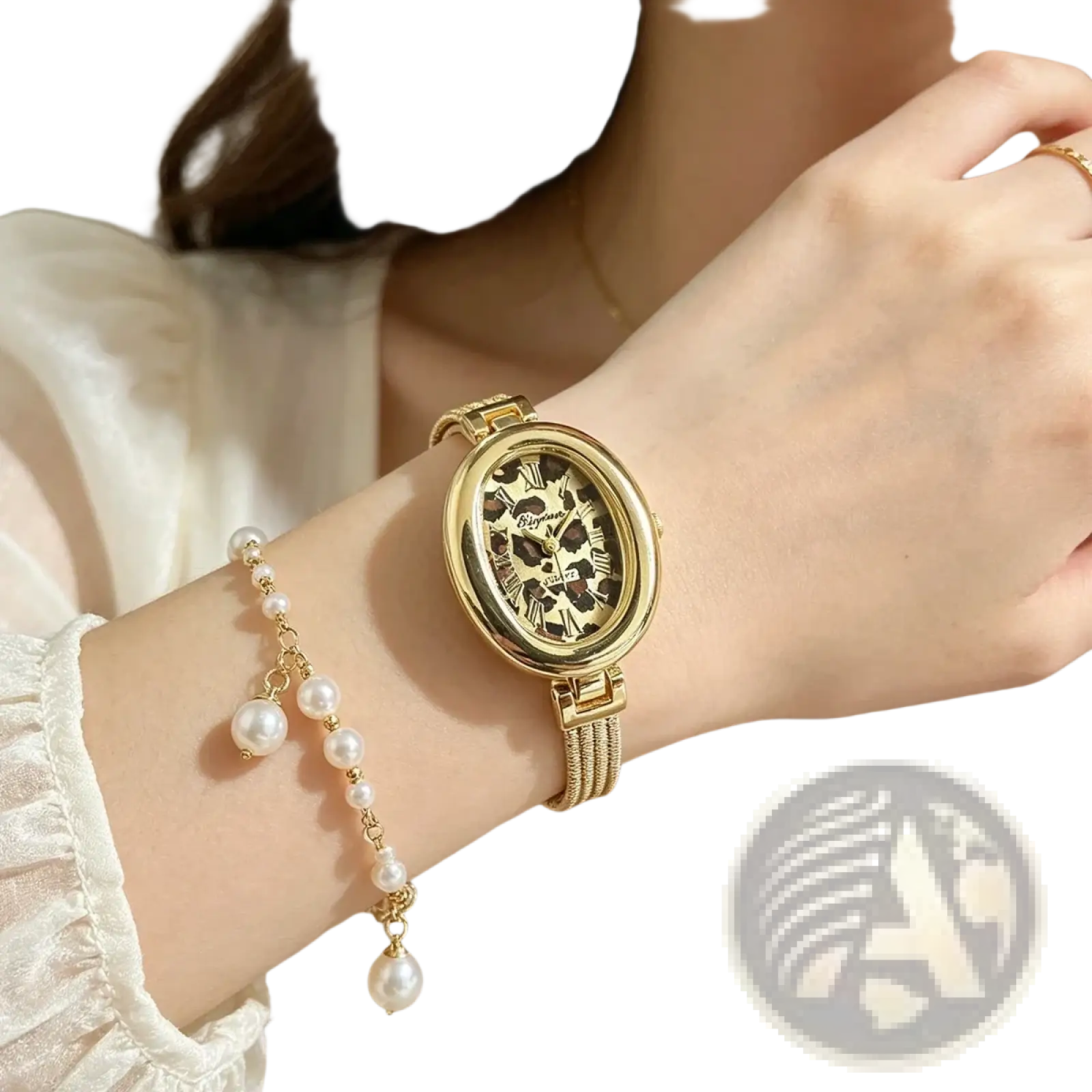 Gold-toned oval quartz women watch with leopard print face and roman numerals paired with matching pearl bracelet