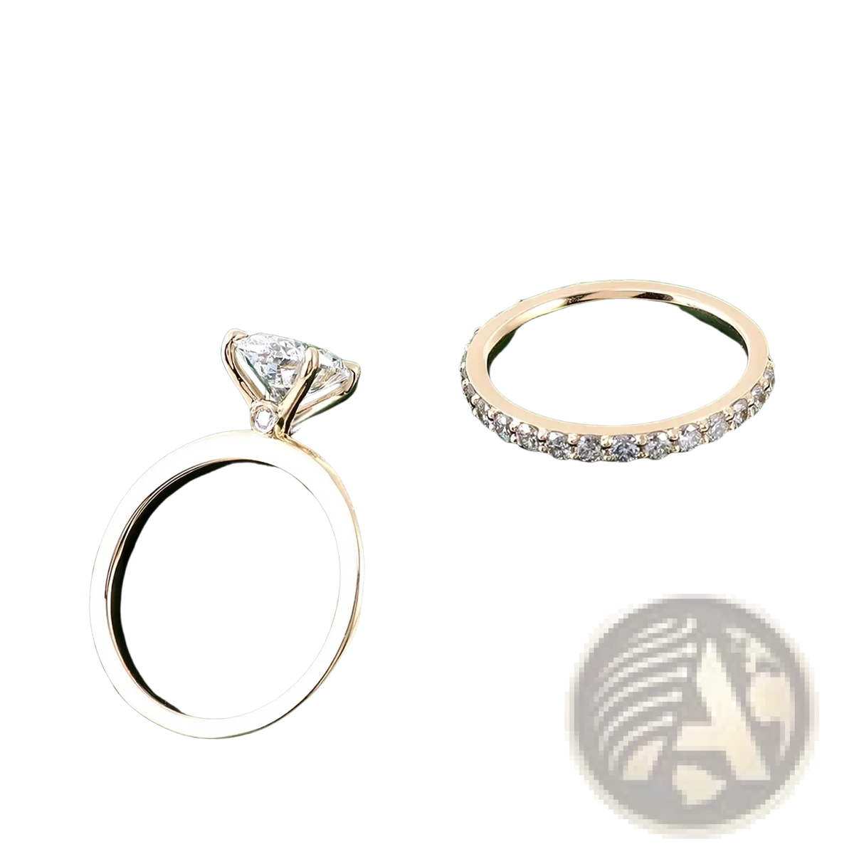 Oval lab diamond bridal set gold featuring a gold engagement ring with central and accent diamonds and a pavé eternity band