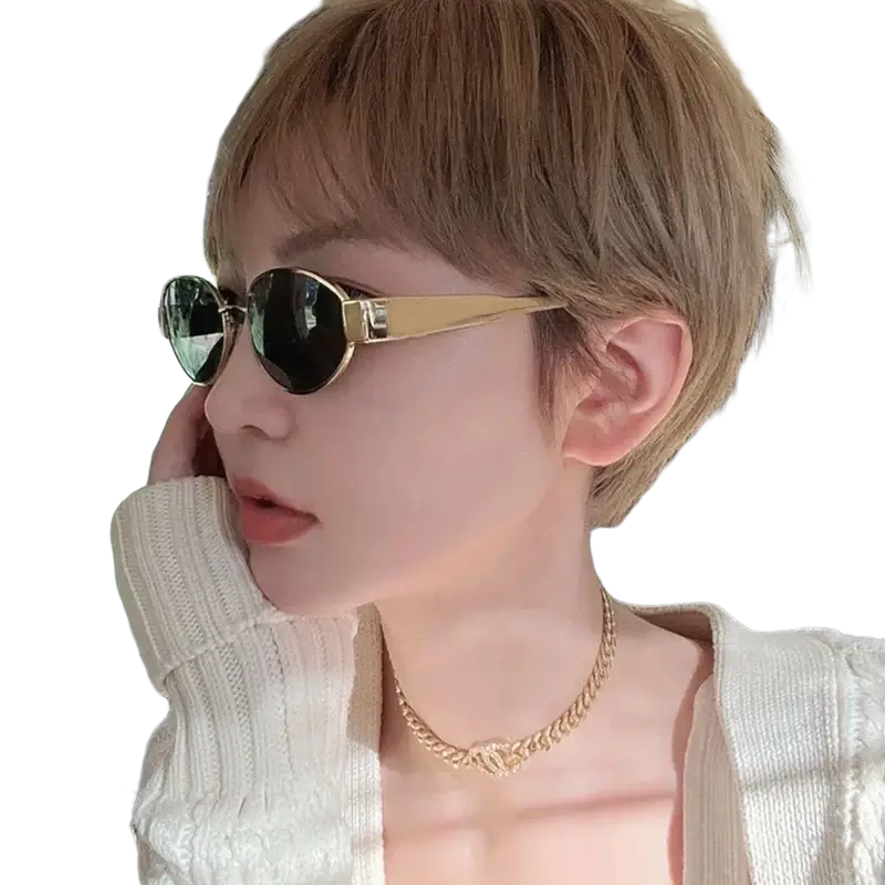 Oval sunglasses for women and men with gold metal frame and dark lenses suitable for stylish outdoor use