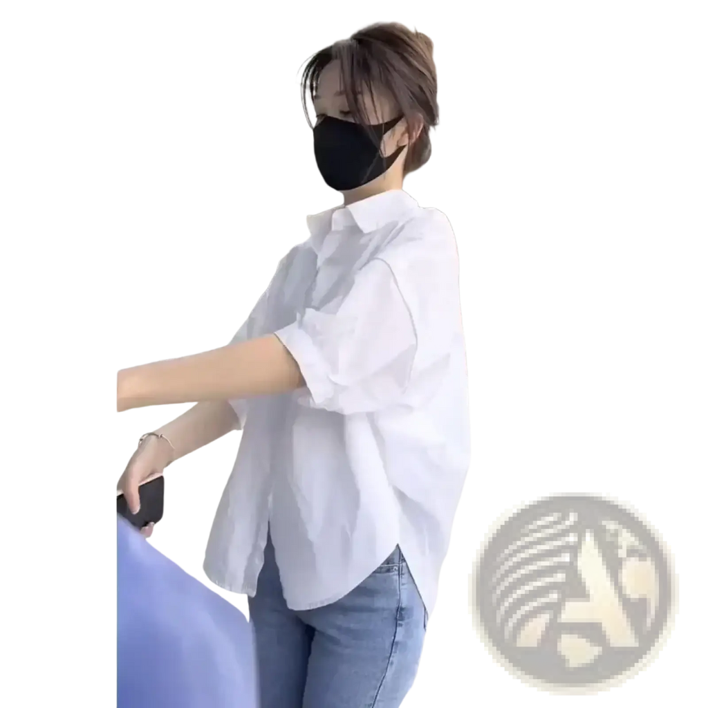 White oversized button up shirt for women with relaxed fit and short sleeves ideal for office casual wear