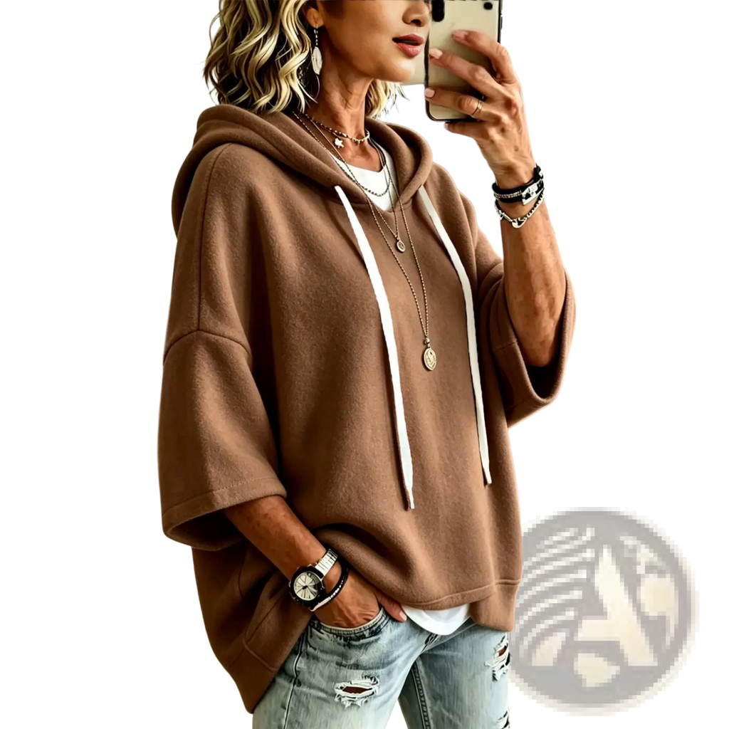 A cozy brown oversized fleece hooded top with white drawstrings and three-quarter sleeves for relaxed comfort