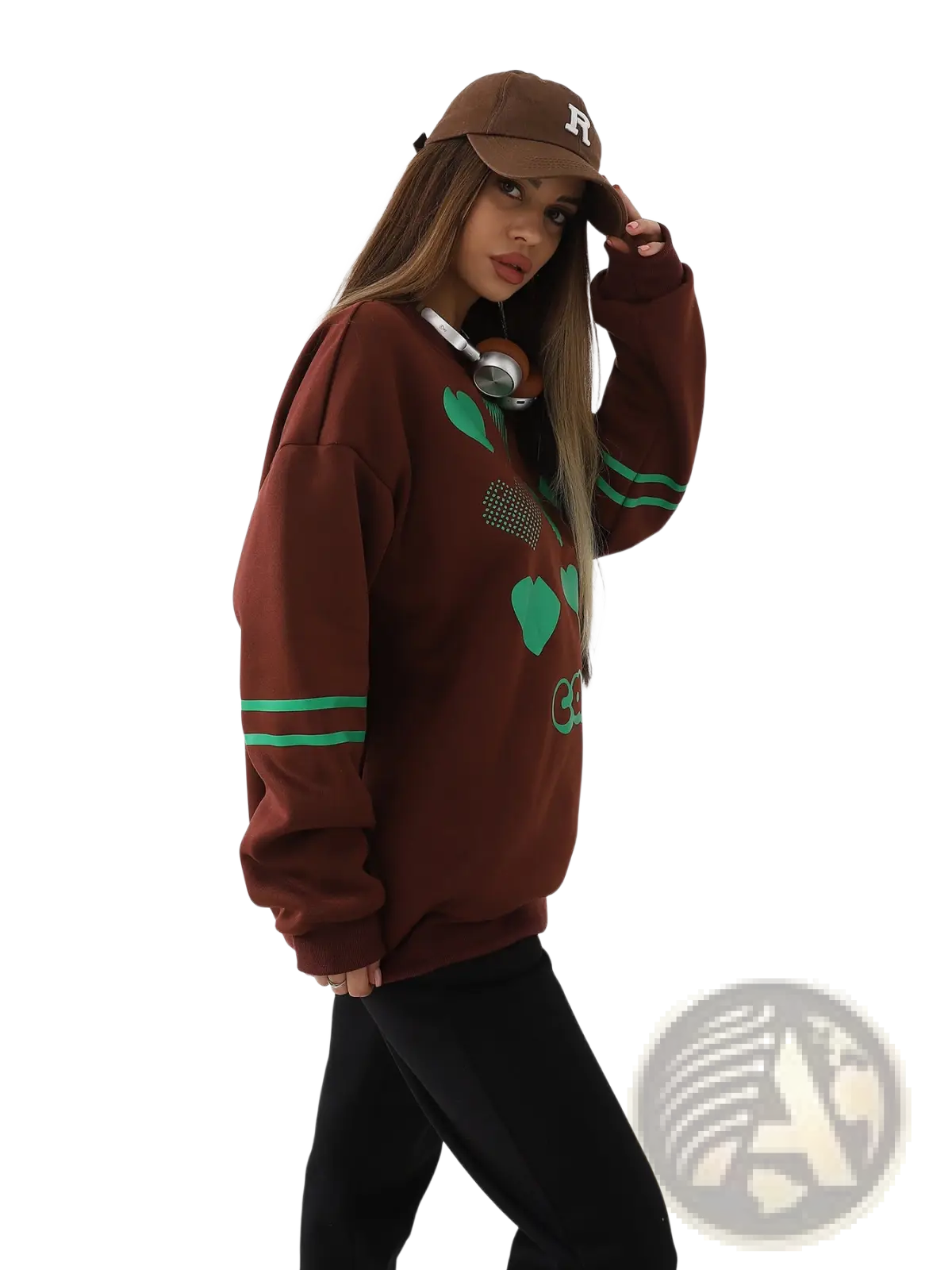 Brown oversized heart pattern graphic sweatshirt with green heart geometric designs and two horizontal sleeve stripes