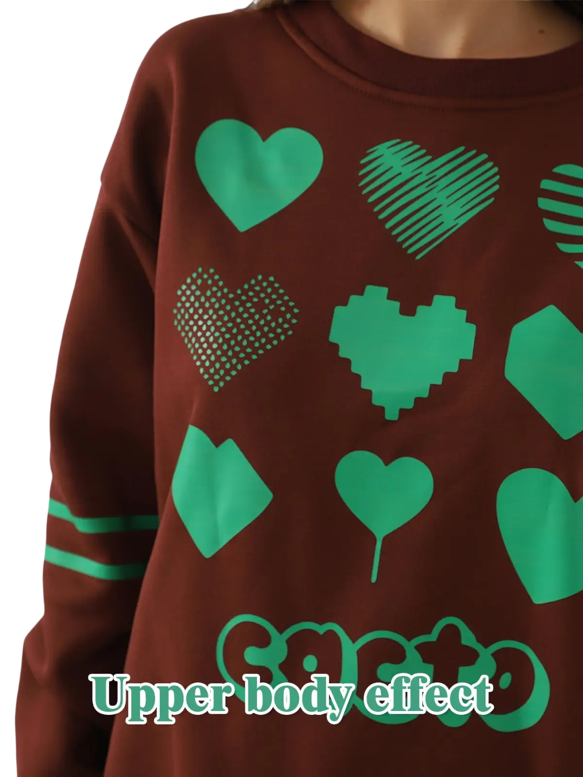 Brown oversized heart pattern graphic sweatshirt featuring playful green hearts in solid, striped, pixelated, and dotted styles