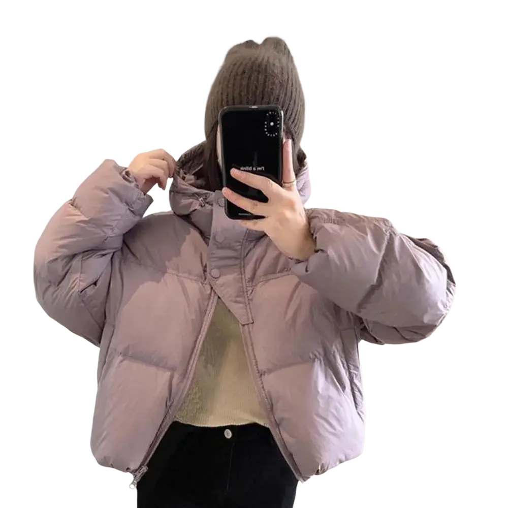 A cozy oversized hooded winter puffer jacket in lavender with buttoned front made of down material
