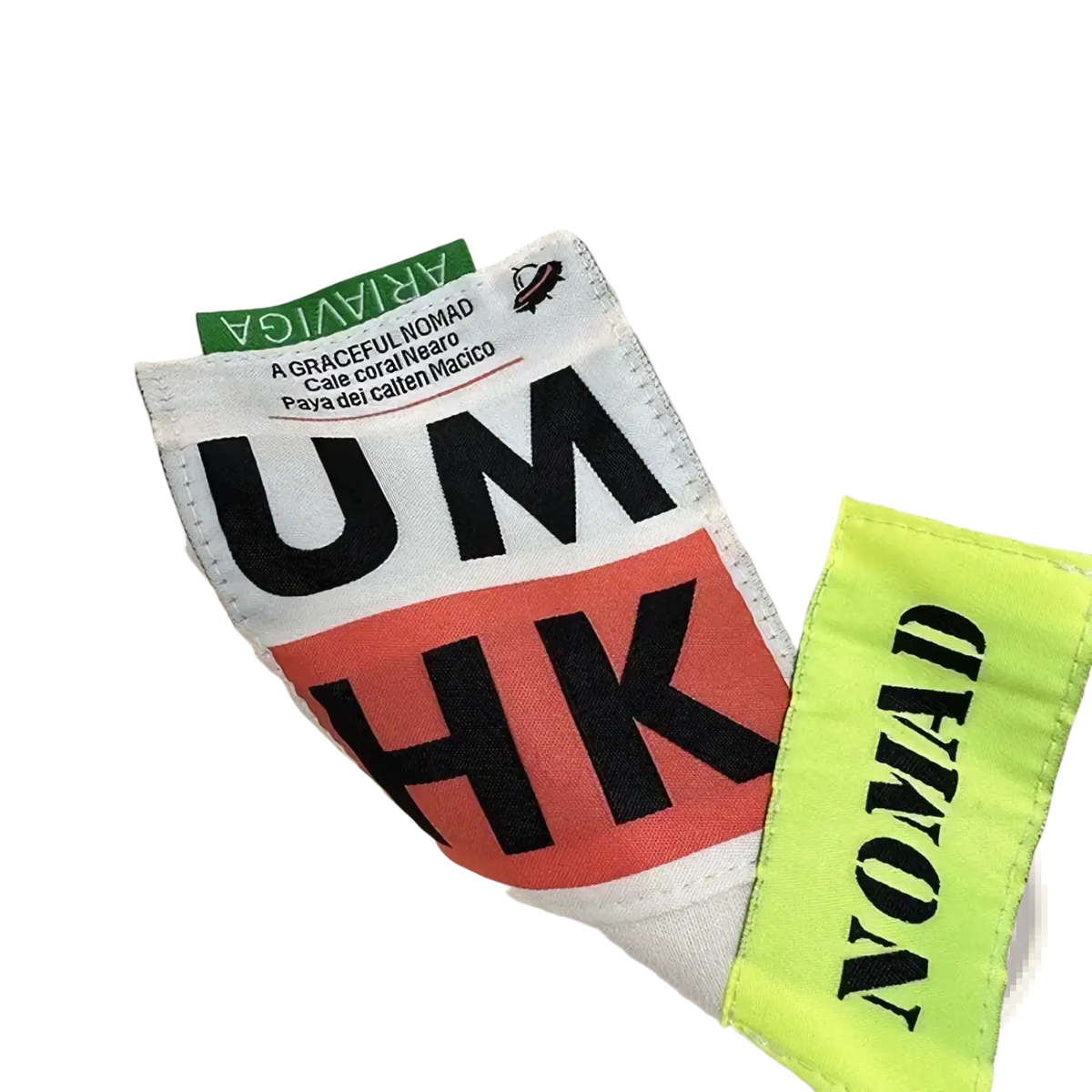 Cream-colored oversized Korean sweatshirt with bold black and orange patch lettering and neon green nomad fabric tags
