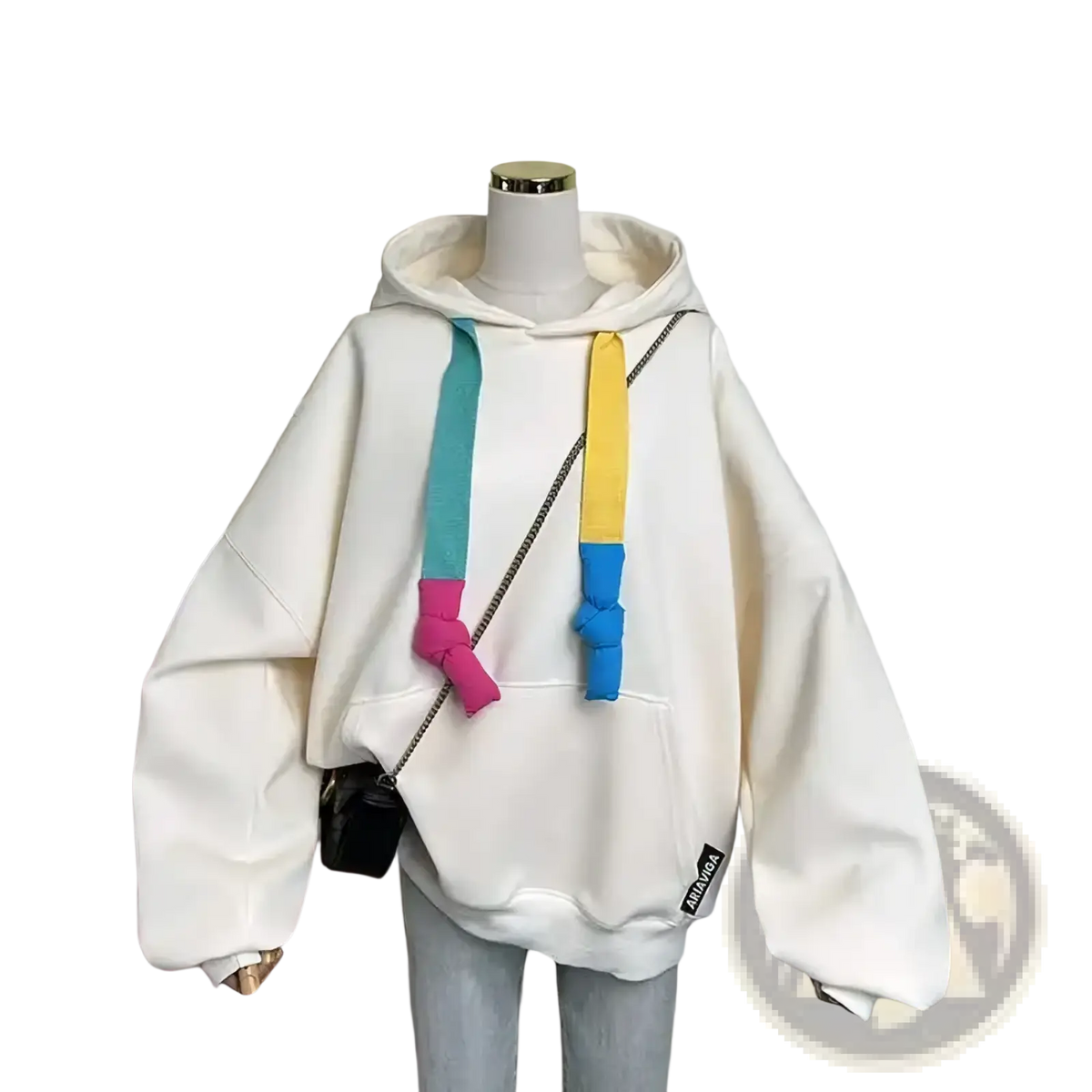 A cozy off-white oversized Korean drawstring hoodie for women with colorful teal yellow and pink knotted drawstrings