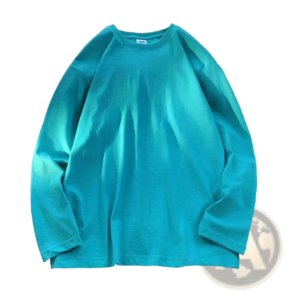 A solid teal oversized long sleeve cotton t-shirt with a classic crew neck perfect for casual wear