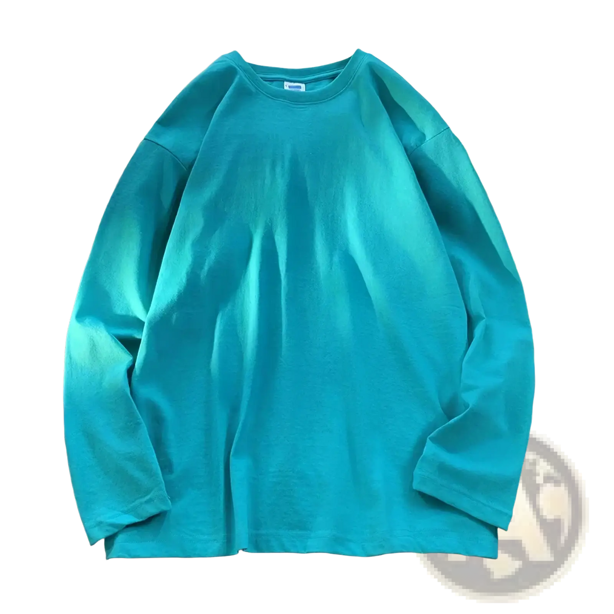 A solid teal oversized long sleeve cotton t-shirt with a classic crew neck perfect for casual wear