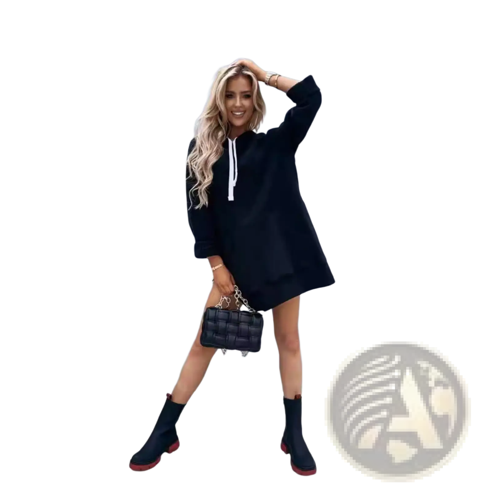 Black quilted handbag with silver chain strap paired with oversized mid-length hooded sweatshirt dress with pockets