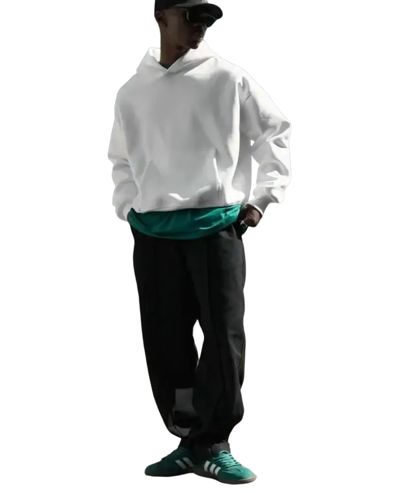 White oversized pullover hooded sweatshirt with relaxed fit and ribbed cuffs worn over teal shirt for street daily use