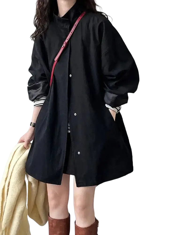 Black oversized button-up shirt with long sleeves and collar featured in oversized single breasted trench coat women product