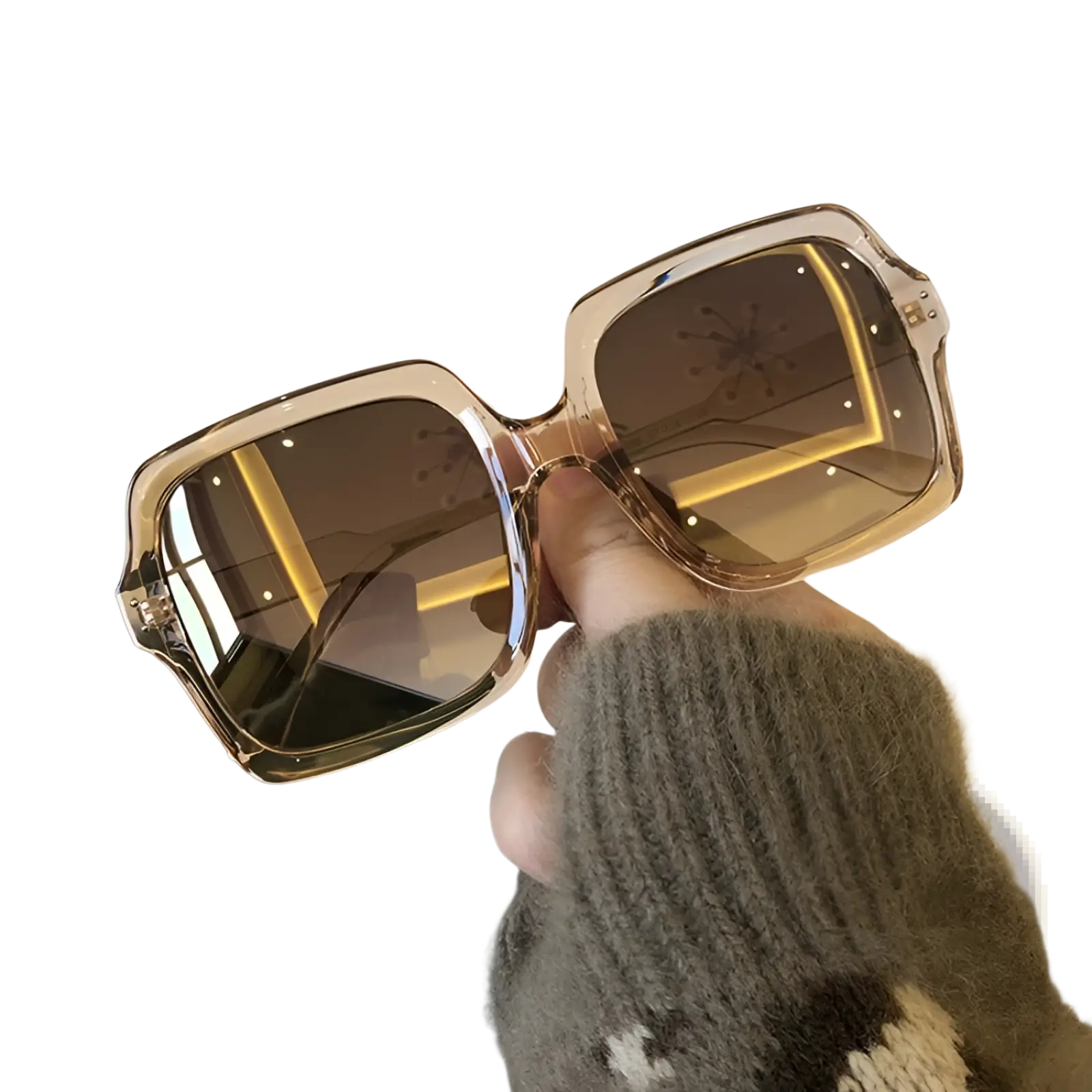 A pair of oversized square fashion sunglasses with translucent amber frames and reflective brown lenses in a sleek design