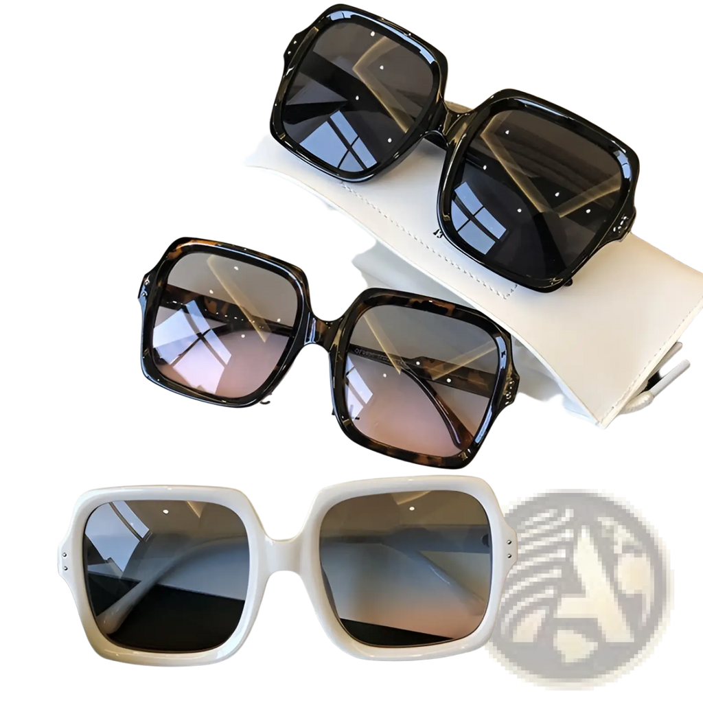 Oversized square fashion sunglasses with translucent black tortoiseshell and white square frames displayed