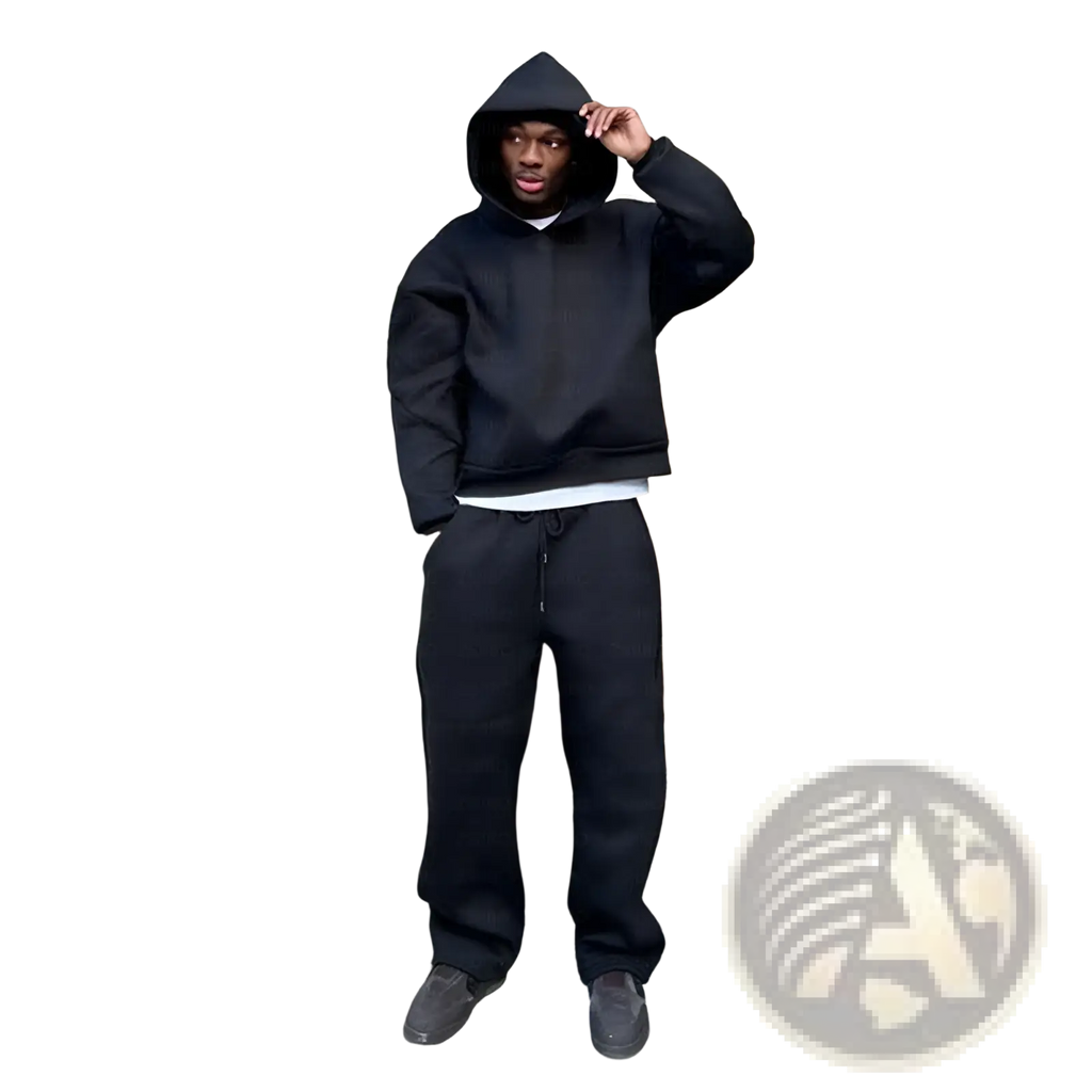 Black oversized unisex streetwear hoodie with drawstring hood and ribbed cuffs from sweatpants set, front view