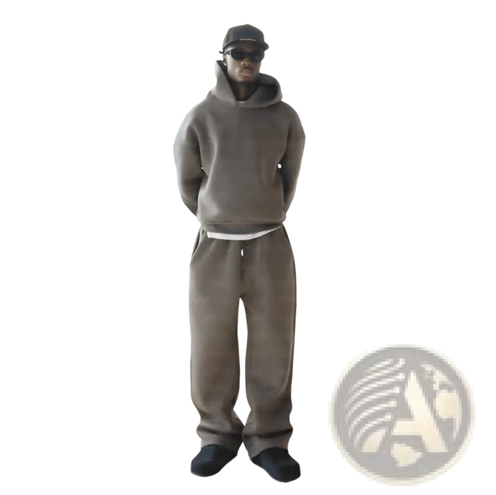 Gray oversized unisex streetwear hoodie and sweatpants set paired with black sneakers for casual wear