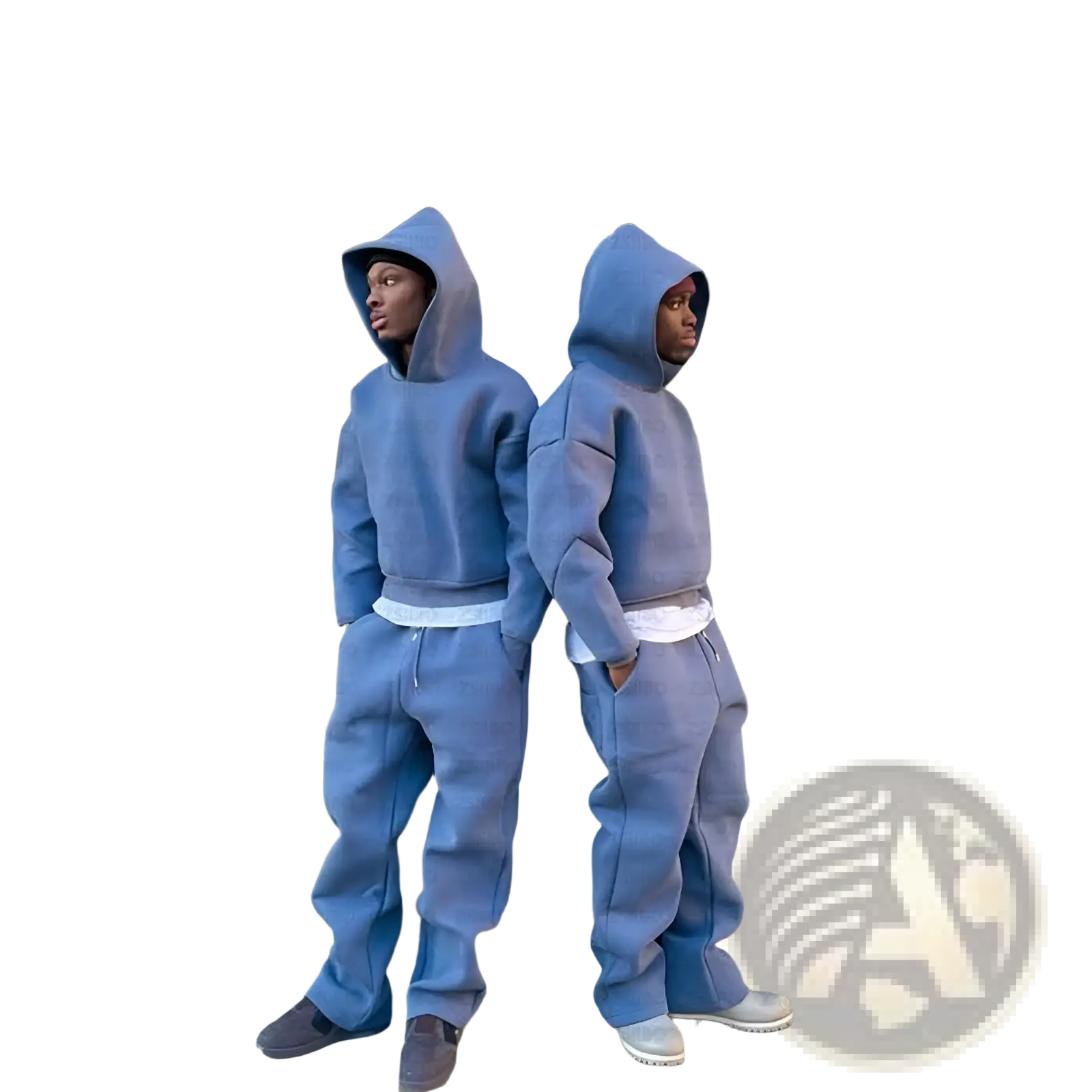 Two individuals wear matching oversized unisex slate blue streetwear hoodie and jogger sets with white waistbands