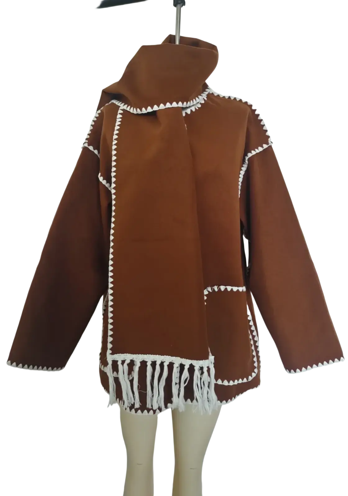 Brown suede oversized wool blend coat with white zigzag stitching and fringe detailing on the back side