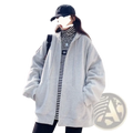 Light gray oversized zip up hoodie with drawstring hood and fleece material worn over black and white striped turtleneck