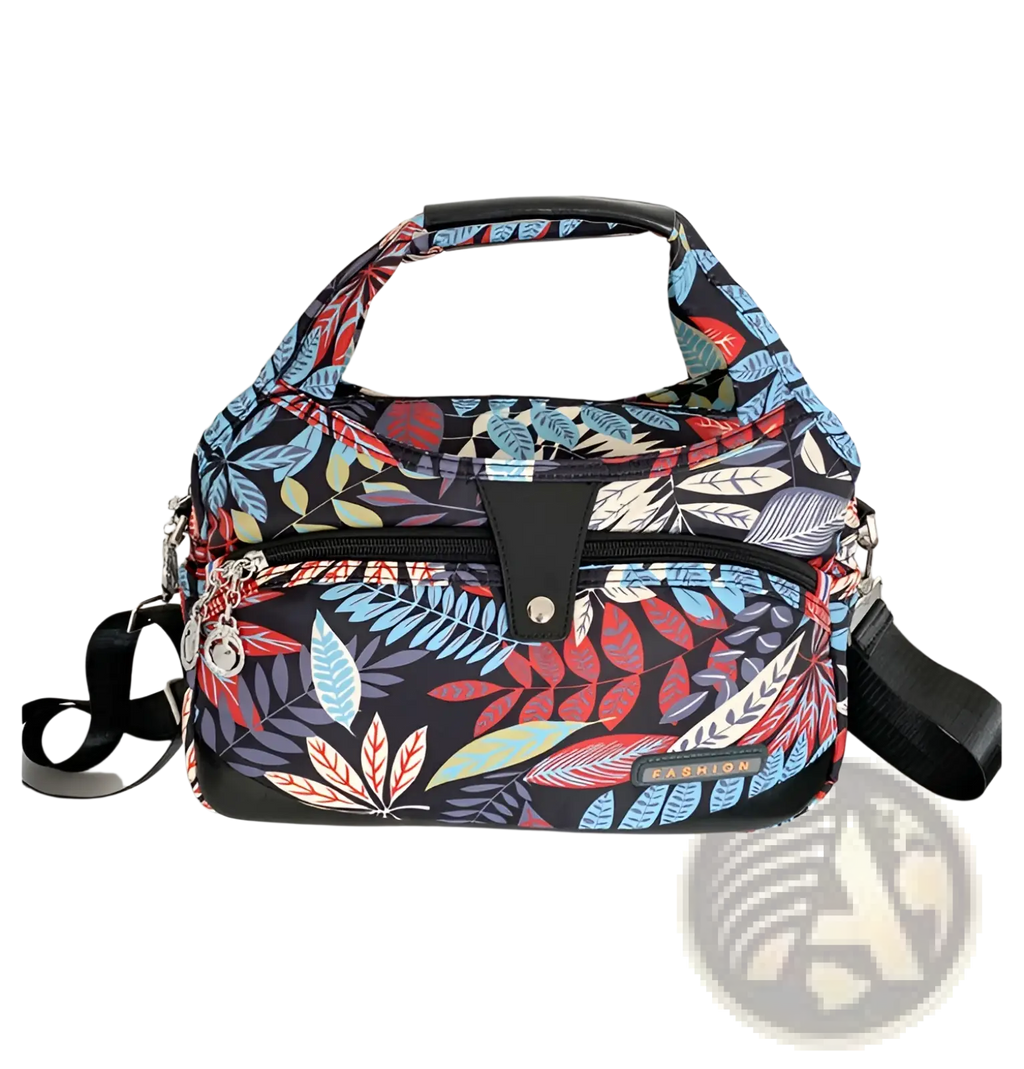 Oxford cloth floral messenger bag with a black base and vibrant red blue and green leaf-patterned foliage design