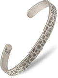 Oxidized hammered silver stainless steel cuff bracelet with silver-toned open design and textured reptile skin pattern