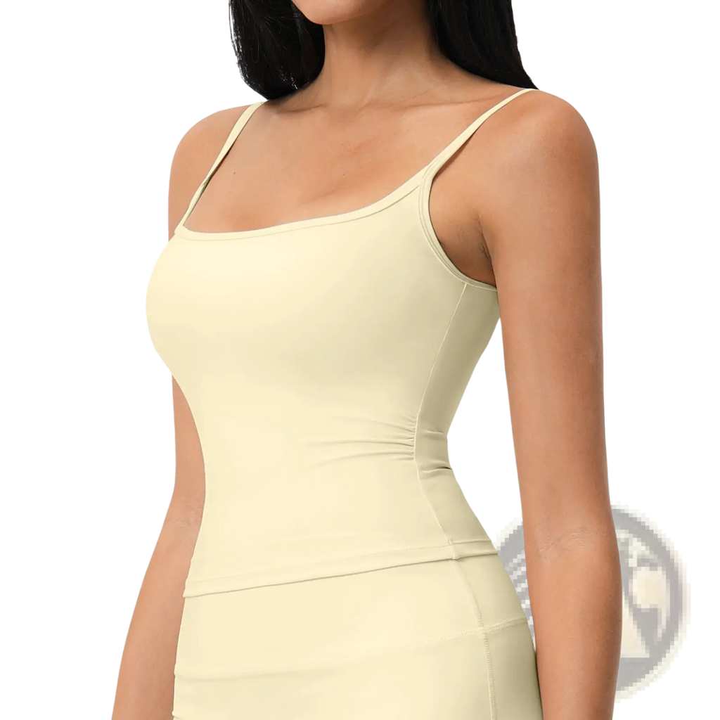 Cream-colored padded sports tank top with thin straps and subtle seams quick drying workout activewear