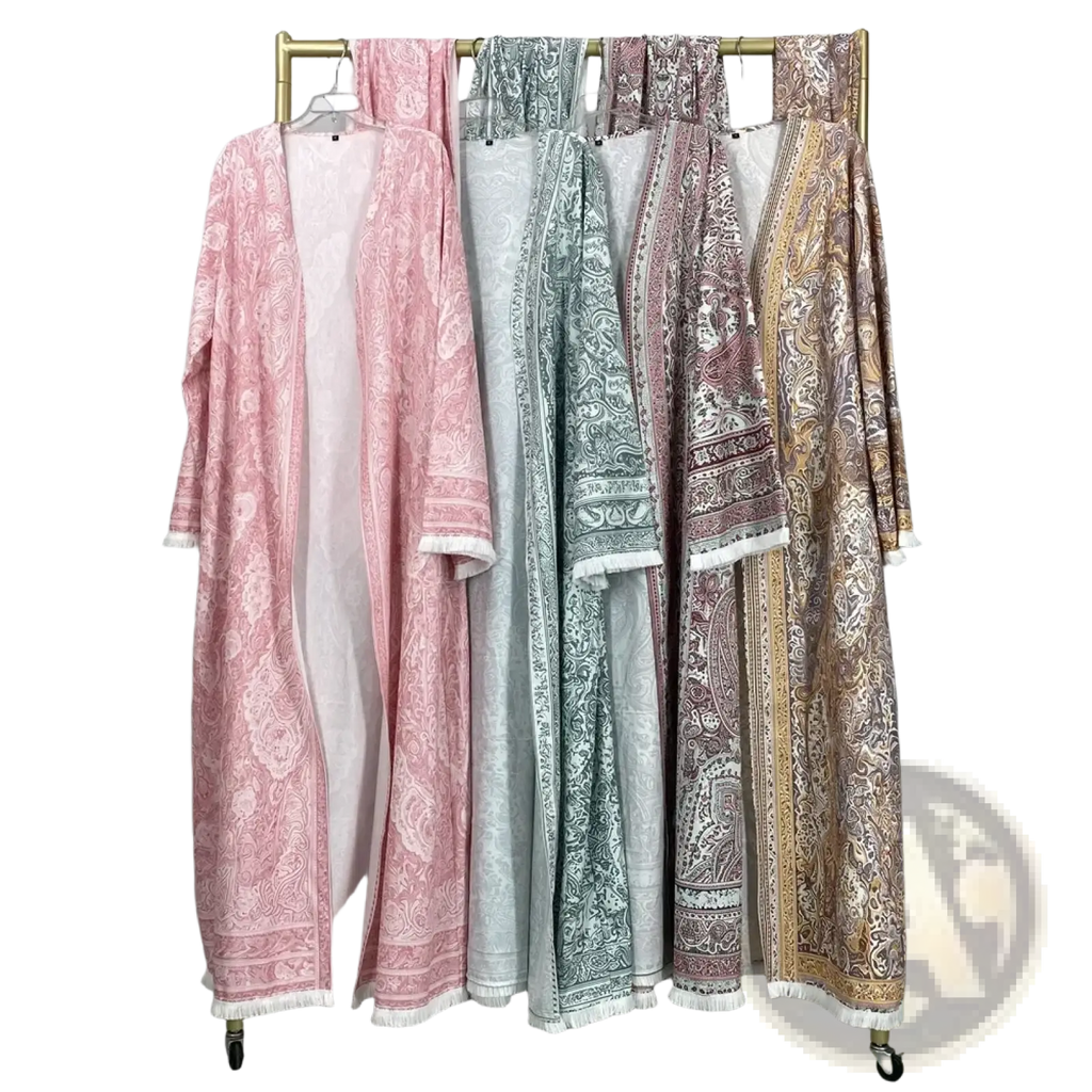 A collection of paisley tassel open abaya Islamic robes in soft pastel and earthy tones with white fringed hems