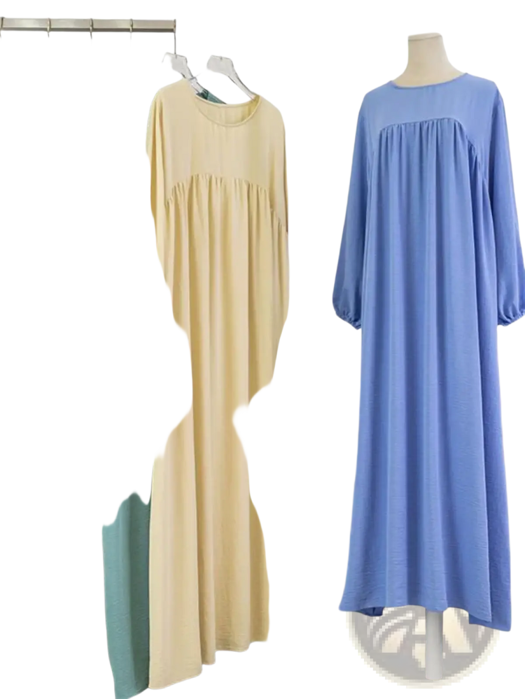 A pale yellow Dubai abaya long modest dress with soft flowing fabric gathered waist and elasticated long sleeves