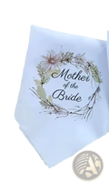 White cotton parent wedding handkerchief featuring a delicate floral wreath and mother of the bride script text