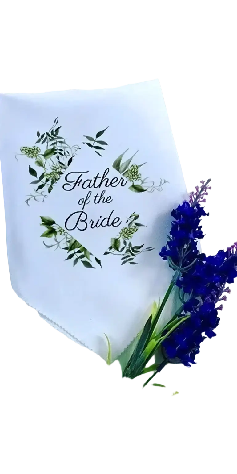 White cotton handkerchief embroidered with father of the bride in black script and green leaf vine design for weddings