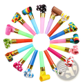 A 10 pack of colorful party blower noisemakers with gold metallic accents and assorted patterns for kids birthdays