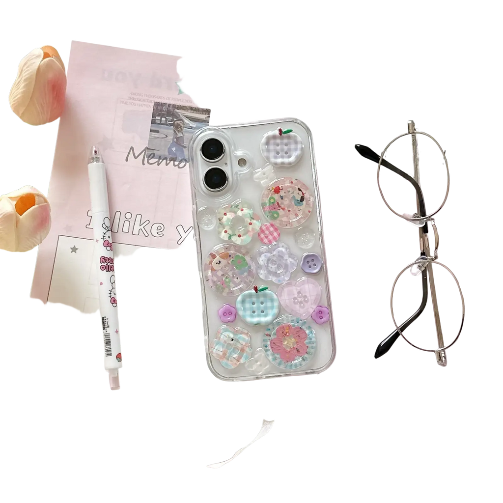 Back side of pastel button clear iPhone case featuring colorful translucent button and flower charms in pastel shades