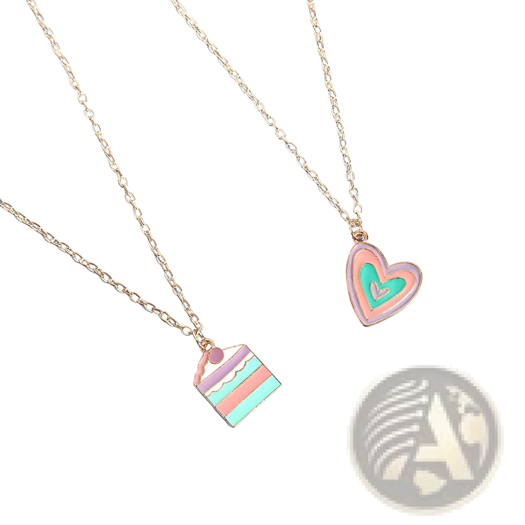 Pastel enamel heart and layered cake pendant necklace set with gold-toned chains featuring cake slice and heart designs